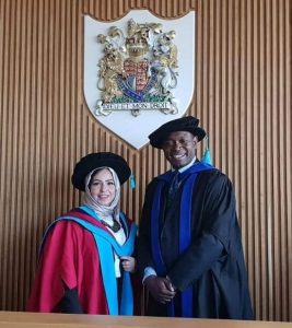 Dr. Zainab and her supervisor on her graduation ceremony from University of Huddersfield phd in international law and international 