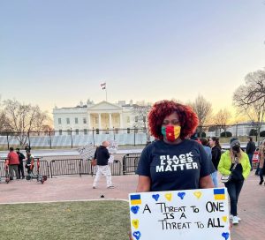 Dr. Antoinette Carole Grace Mbarga protesting 