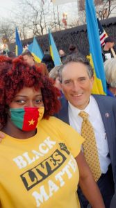 Dr. Antoinette Carole Grace Mbarga with Congressman Andy Levin one of the organizers