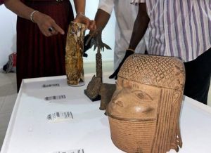 Some of the 119 Benin bronzes from Netherlands are displayed on a table during the return of some artefacts to Nigeria, marking one of the largest restitutions of colonial-era artefacts since British forces looted the treasures from Benin City in 1897, at the National Museum in Lagos, Nigeria. (AFP)