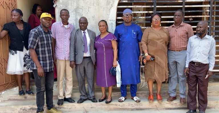 Hon. Sadiq. O. Raji in the midst of the LCDA Council member staffs