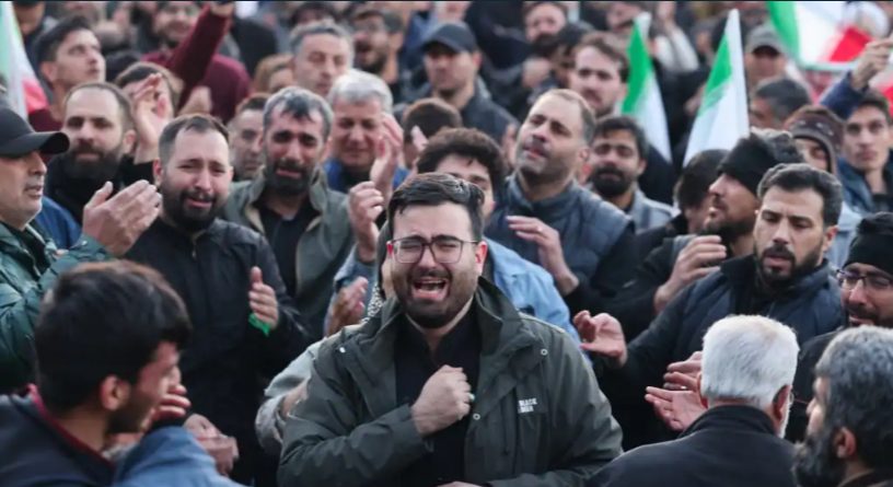 Iranians mourn the death of Ayatollah Ali Khamenei in Tehran on February 28 after Iran's supreme leader was killed in US‑Israeli airstrikes.