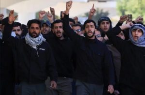 Protesters supporting Iraqi Shi'ite armed groups demonstrate near the entrance of Baghdad’s Green Zone after the killing of Khamenei.Iraqi police fired tear gas and stun grenades to scatter hundreds of pro-Iranian protesters, Reuters reports.