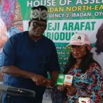 Presentation of membership card to Hon. Arafat