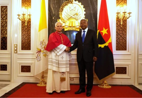 Pope Leo XIV shakes hands with Angola's President Joao Lourenco, during their meeting at the Presidential Palace in Luanda, Angola, on April 18, 2026. Credit: OSV News photo/Andrew Medichini, pool via Reuters