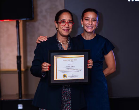 Andrea Quaye Receiving Award