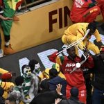 Senegal supporters clash during the Africa Cup of Nations (CAN) final football match between Senegal and Morocco at the Prince Moulay Abdellah Stadium in Rabat on January 18, 2026. (Photo by Paul ELLIS / AFP)