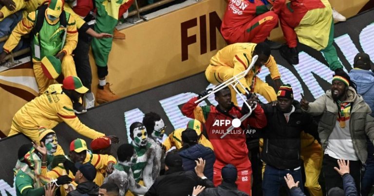 Senegal supporters clash during the Africa Cup of Nations (CAN) final football match between Senegal and Morocco at the Prince Moulay Abdellah Stadium in Rabat on January 18, 2026. (Photo by Paul ELLIS / AFP)