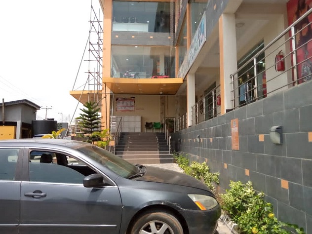 From Concept to Concrete: Anchor Mall, Ibadan A striking mixed-use commercial development along the New Akala Express Road, Oluyole, strategically designed for local constructability and long-term sustainability. The project seamlessly bridges the gap between digital schematic (image.png) and physical infrastructure (image_2.png), utilizing concrete overhangs and optimized glazing for passive climate control in the Oyo State tropical environment.