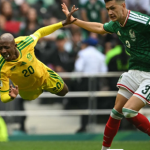 South Africa's defender #20 Khuliso Mudau is fouled by Mexico's defender #03 Cesar Montes during the 2026 World Cup Group A football match between Mexico and South Africa at the Mexico City Stadium in Mexico City on June 11, 2026. (Photo by Yuri CORTEZ / AFP)